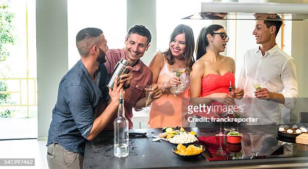 group of friends toasting with drinks - cocktail shaker stock pictures, royalty-free photos & images