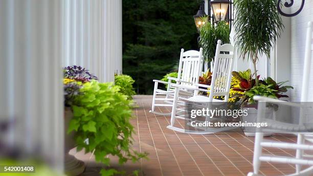 rocking chairs - veranda stock pictures, royalty-free photos & images