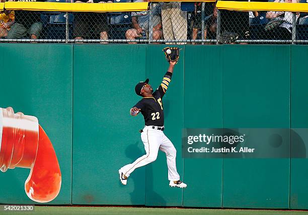 Andrew McCutchen of the Pittsburgh Pirates makes a running catch in the second inning during the game against the San Francisco Giants at PNC Park on...