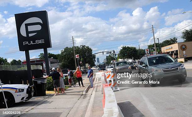 Vehicles cross in front of the Pulse Nightclub on June 21, 2016 in Orlando, Florida. The Orlando community continues to mourn the June 12 shooting at...
