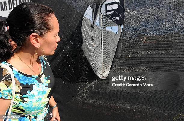 Zila Zurita observes the interior of the Pulse Nightclub building on June 21, 2016 in Orlando, Florida. The Orlando community continues to mourn the...