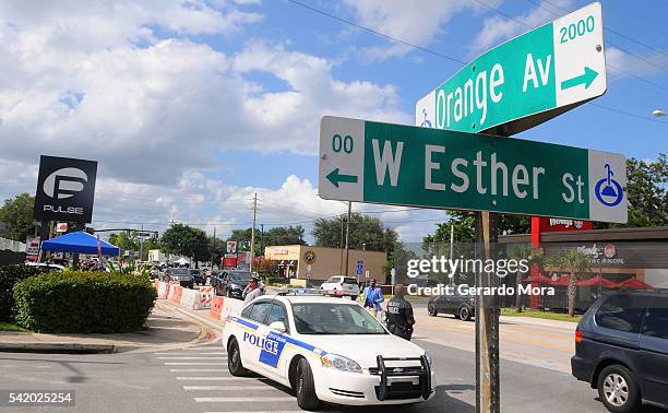 Vehicles cross in front of the Pulse Nightclub on June 21, 2016 in Orlando, Florida. The Orlando community continues to mourn the June 12 shooting at...