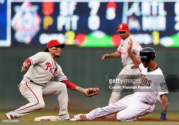 Byron Buxton of the Minnesota Twins steals second base against Freddy Galvis of the Philadelphia Phillies during the second inning of the game on...