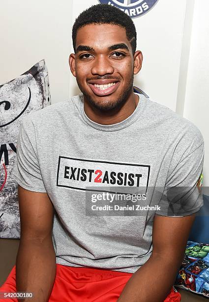 Basketball player Karl-Anthony Towns attends the unveiling with NBA Cares and State Farm of NYC Assist, a Teen Learning Center at Educational...
