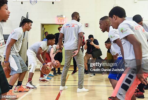 All-Star Chris Paul hosts a basketball clinic during the unveiling with NBA Cares and State Farm of NYC Assist, a Teen Learning Center at Educational...