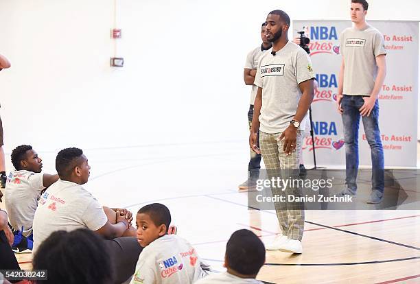 Chris Paul, Kris Dunn and Jakob Poeltl attend the unveiling with NBA Cares and State Farm of NYC Assist, a Teen Learning Center at Educational...