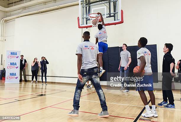 Prospects Kris Dunn and Jakob Poeltl attend a basketball clinic during the unveiling with NBA Cares and State Farm of NYC Assist, a Teen Learning...