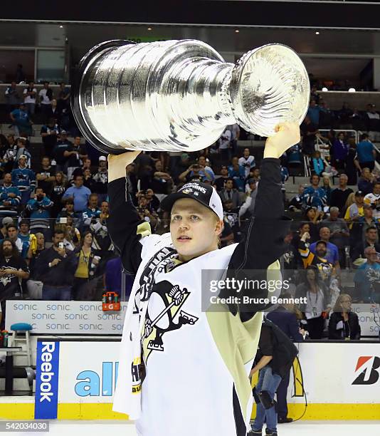 Olli Maatta of the Pittsburgh Penguins celebrates with the Stanley Cup after their 3-1 victory to win the Stanley Cup against the San Jose Sharks in...