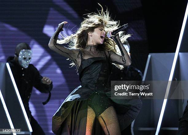 Singer Selena Gomez performs during her 'Revival Tour' at Bridgestone Arena on June 21, 2016 in Nashville, Tennessee.