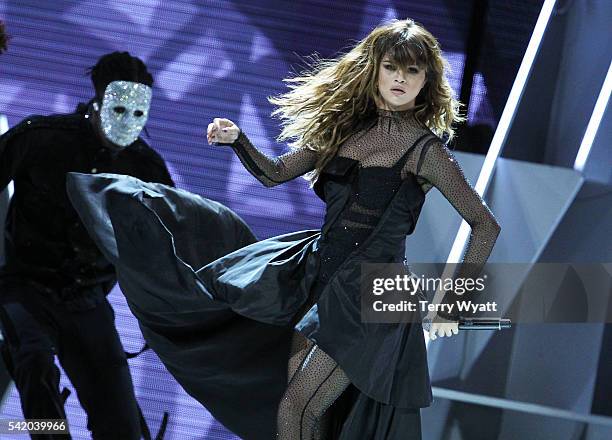 Singer Selena Gomez performs during her 'Revival Tour' at Bridgestone Arena on June 21, 2016 in Nashville, Tennessee.