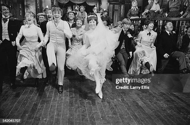 English entertainer Tommy Steele and English actress Julia Foster during the wedding scene from George Sidney's musical film 'Half a Sixpence', 6th...