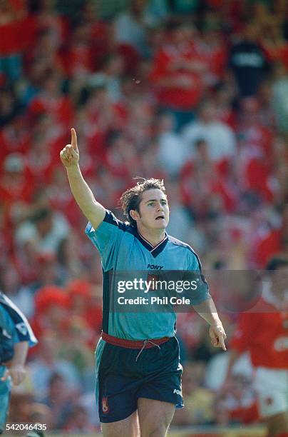 English footballer Frank Lampard of West Ham celebrates his goal against Barnsley in an English Premier League match at the Oakwell stadium,...