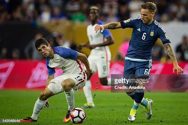 Christian Pulisic of USA struggle for the ball against Lucas Biglia of Argentina during the 2016 Copa America Centenario Semi-final match between USA...