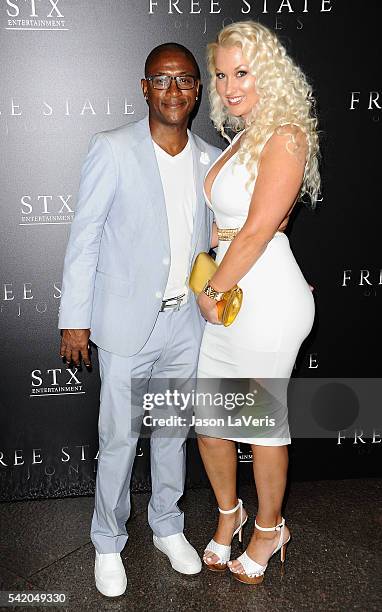 Actor Tommy Davidson and wife Amanda Moore attend the premiere of "Free State of Jones" at DGA Theater on June 21, 2016 in Los Angeles, California.