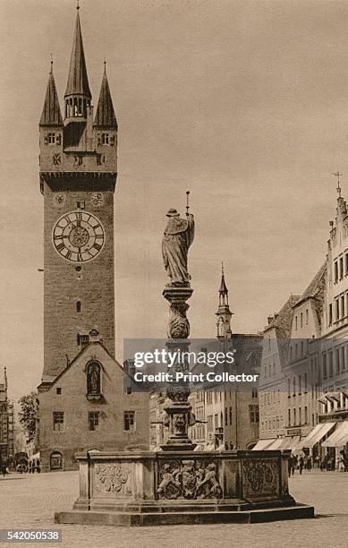 Straubing - Ludwigsplatz with Town Tower and Fountain of 1644', 1931. From Deutschland by Kurt Hielscher. [F. A. Brockhaus, Leipzig, 1931] Artist:...