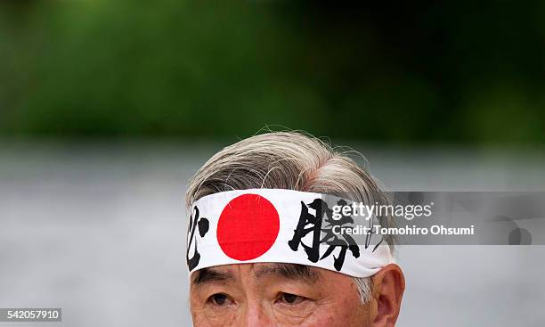 Mitsuhide Iwaki, a candidate from the Liberal Democratic Party, attends an election campaign rally on June 22, 2016 in Koriyama, Japan. The...