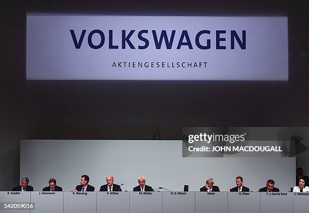 Audi CEO and member of the Board of Management of German carmaker Volkswagen Rupert Stadler, VW member of the board Jochem Heizmann, VW member of the...