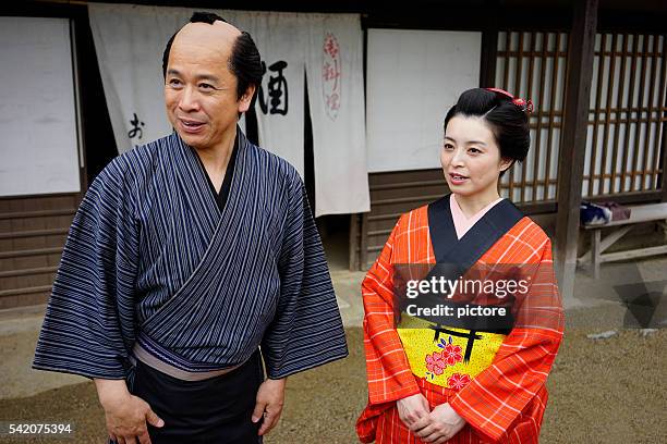 japanese couple in edo period town - topknot stock pictures, royalty-free photos & images