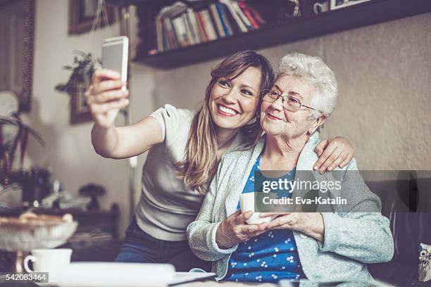 taking selfies - beautiful grandmothers stock pictures, royalty-free photos & images
