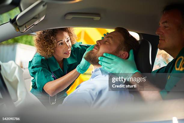 car crash medics - paramedic stock pictures, royalty-free photos & images