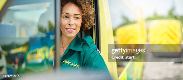 proud female paramedic - paramedic stock pictures, royalty-free photos & images