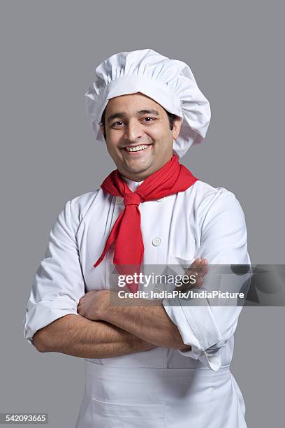 portrait of a chef smiling - großes halstuch stock-fotos und bilder