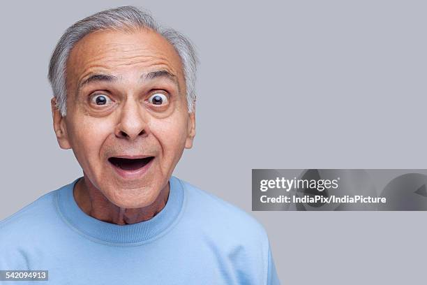 portrait of surprised senior man - man open mouth stock pictures, royalty-free photos & images