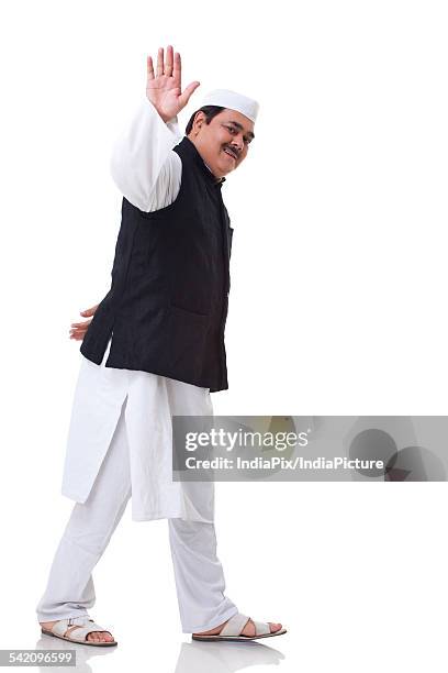 politician waving over white background - waving hands goodbye stock-fotos und bilder