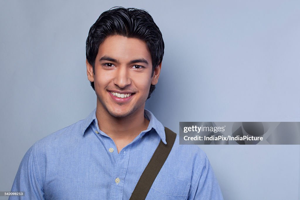 Close-up of young man smiling