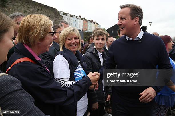 British Prime Minister David Cameron greets supporters after addressing pro-EU "Vote Remain" supporters at rally on June 22, 2016 in Bristol, United...