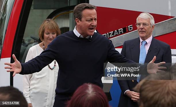 British Prime Minister David Cameron addresses pro-EU "Vote Remain" supporters with Labour MP Harriet Harman and former Conservative Prime Minister...