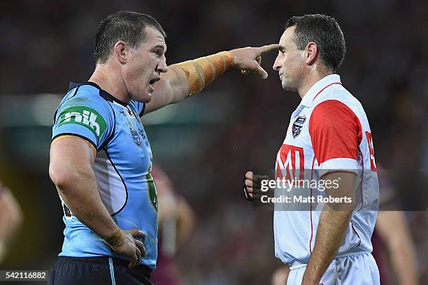 Paul Gallen of the Blues speaks with referee Gerard Sutton during game two of the State Of Origin series between the Queensland Maroons and the New...