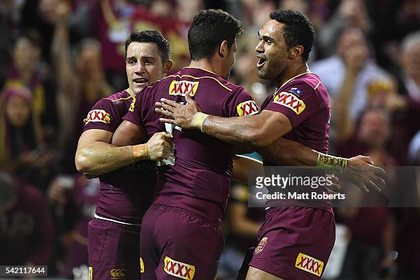 Dane Gagai of the Maroons celebrates scoring a try with Cooper Cronk and Justin OÕNeill of the Maroons during game two of the State Of Origin series...