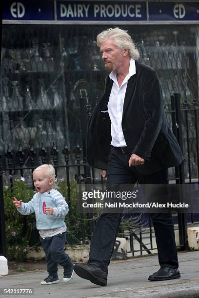 Richard Branson seen with his grandchild in Notting Hill on JUNE 20, 2016 in London, England.