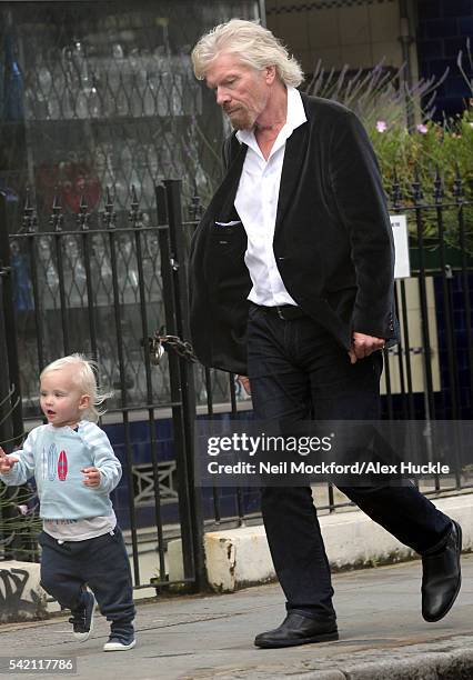 Richard Branson seen with his grandchild in Notting Hill on JUNE 20, 2016 in London, England.