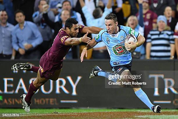 James Maloney of the Blues runs in for a try during game two of the State Of Origin series between the Queensland Maroons and the New South Wales...
