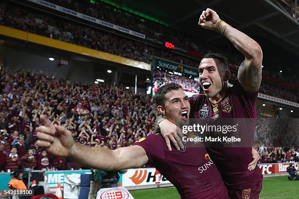 Corey Oates of the Maroons celebrates with his team mate Darius Boyd of the Maroons after scoring a try during game two of the State Of Origin series...