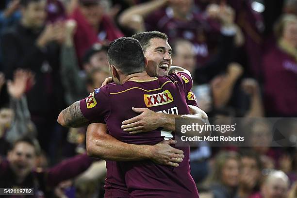 Corey Oates of the Maroons celebrates with Darius Boyd during game two of the State Of Origin series between the Queensland Maroons and the New South...