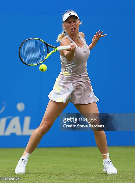 Caroline Wozniacki of Denmark plays a forehand during her third round women's singles match against Monica Puig of Puerto Rico on day four of the WTA...