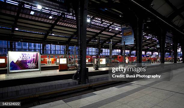 friedrichstrasse station (bahnhof berlin friedrichstraße) at twilight, berlin, germany - deutsche bahn bahnhof bildbanksfoton och bilder