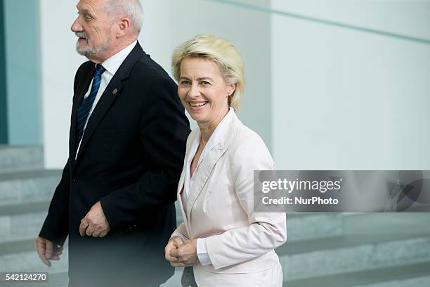 German Defence Minister Ursula von der Leyen chats with Polish Minister for National Defence Antoni Macierewicz prior to a familiy picture of the...