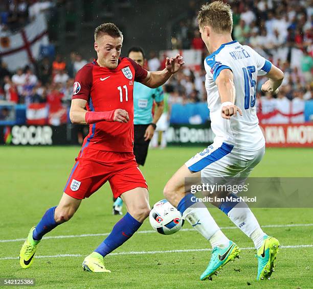 Jamie Vardy of England vies with Tomas Hubocan of Slovakia during the UEFA EURO 2016 Group B match between Slovakia v England at Stade...