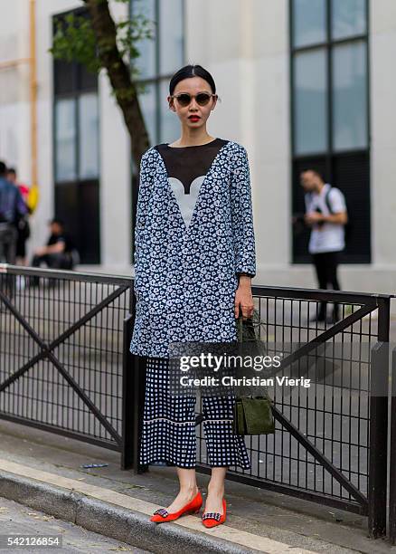 Sherry Shen outside Balenciaga during the Paris Fashion Week Menswear Spring/Summer 2017 on June 22, 2016 in Paris, France.