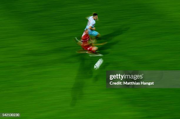 Burak Yilmaz of Turkey fights for the ball during the UEFA EURO 2016 Group D match between Czech Republic and Turkey at Stade Bollaert-Delelis on...