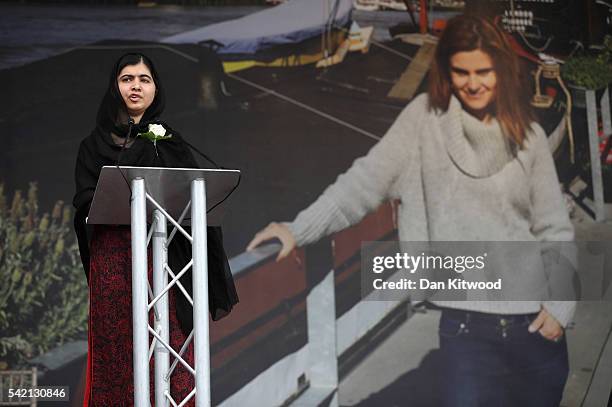 Human rights campaigner Malala Yousafzai delivers a speech on stage during a memorial event for murdered Labour MP Jo Cox at Trafalger Square on June...