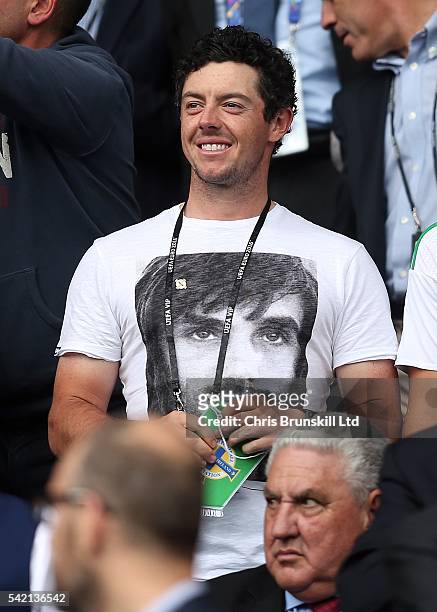 Golfer Rory McIlroy looks on during the UEFA Euro 2016 Group C match between the Northern Ireland and Germany at Parc des Princes on June 21, 2016 in...