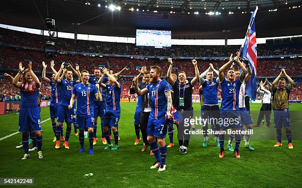 Iceland players celebrate victory in the UEFA EURO 2016 Group F match between Iceland and Austria at Stade de France on June 22, 2016 in Paris,...