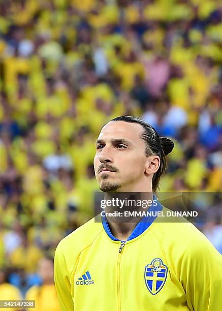 Sweden's forward Zlatan Ibrahimovic listens to the national anthem before the Euro 2016 group E football match between Sweden and Belgium at the...