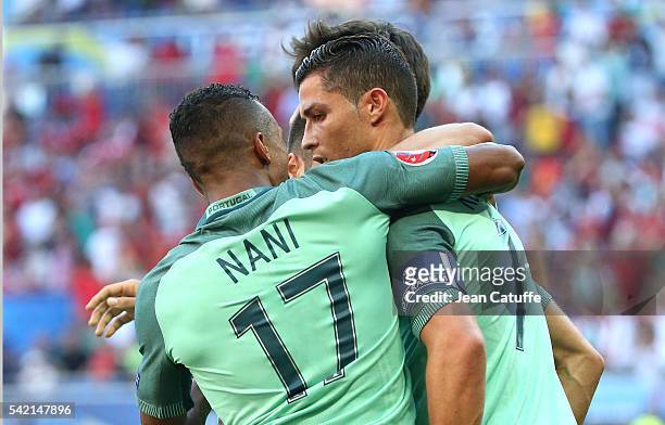 Cristiano Ronaldo of Portugal celebrates his last goal with Nani and teammates during the UEFA EURO 2016 Group F match between Hungary and Portugal...