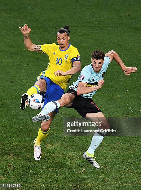 Zlatan Ibrahimovic of Sweden and Thomas Meunier of Belgium challenge for the ball during the UEFA EURO 2016 Group E match between Sweden and Belgium...